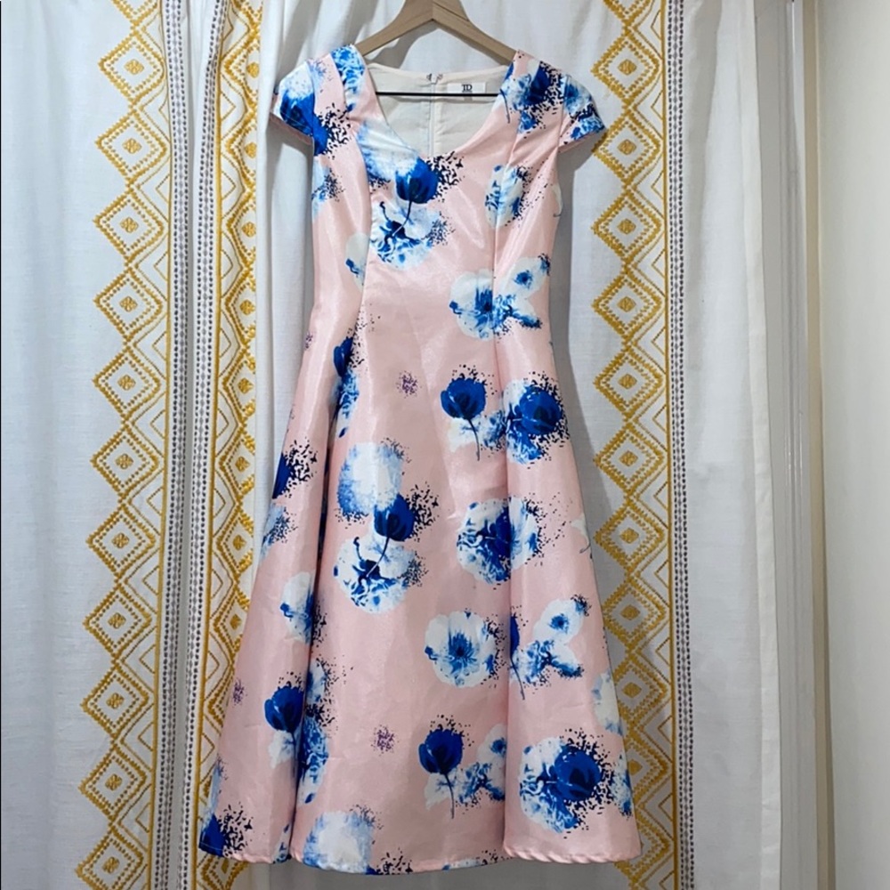 Pink dress with blue and white flora detail